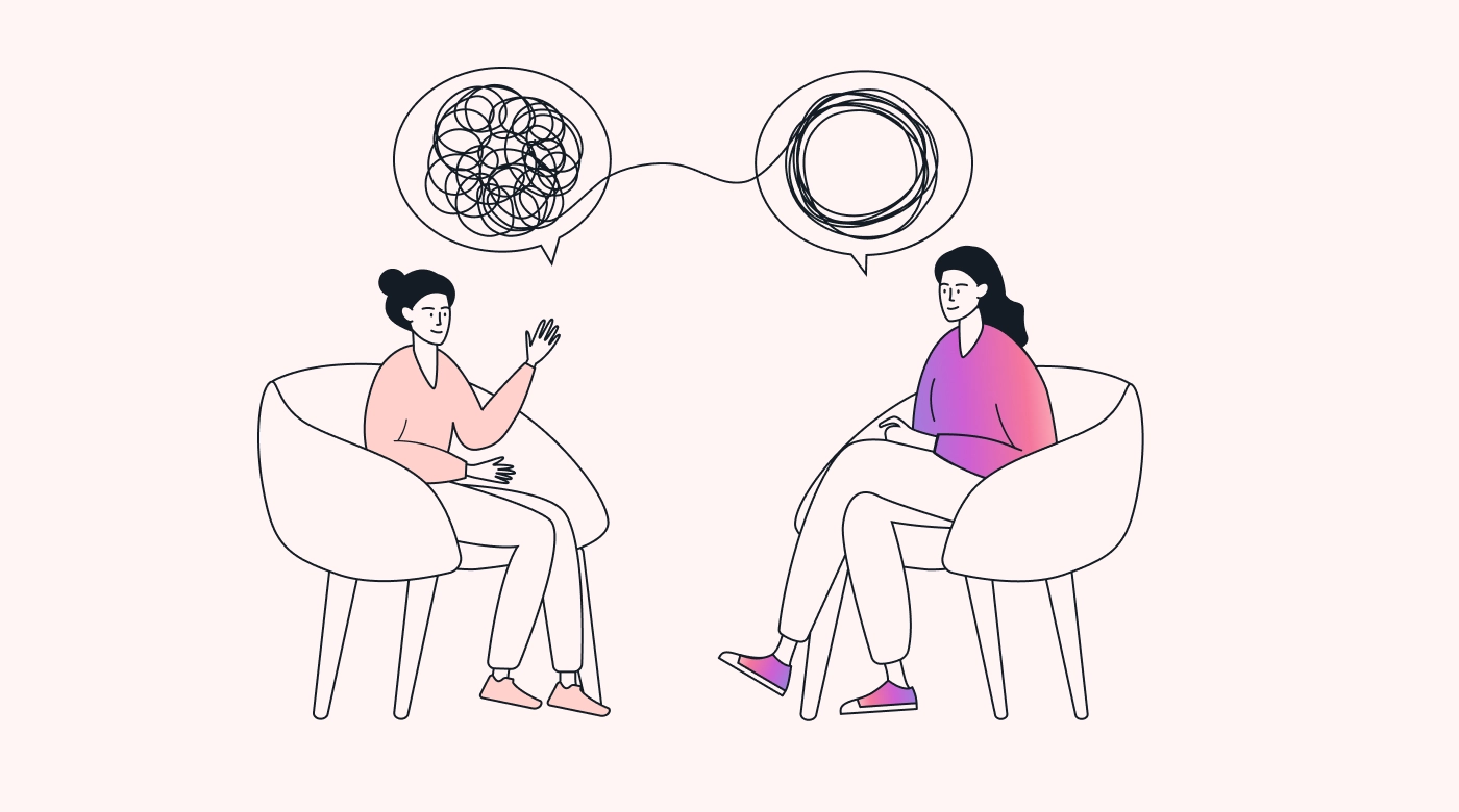 A psychologist talking to their patient.